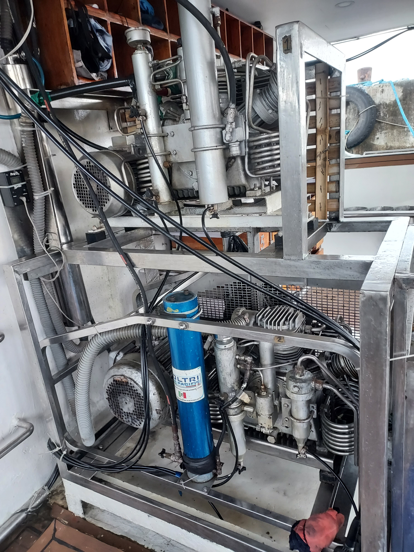 Dual Coltri Sub Pacific compressors racked onboard a dive vessel