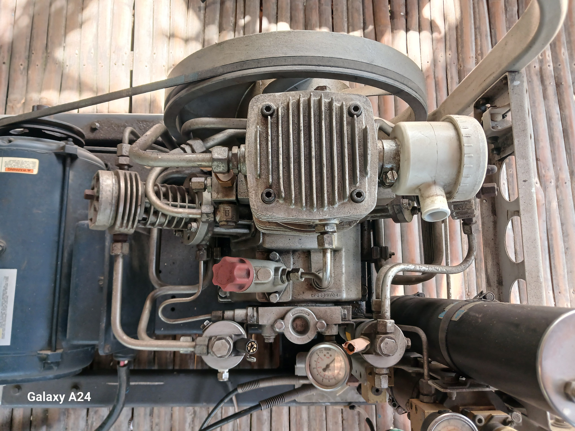 Compressor head and pulley close-up