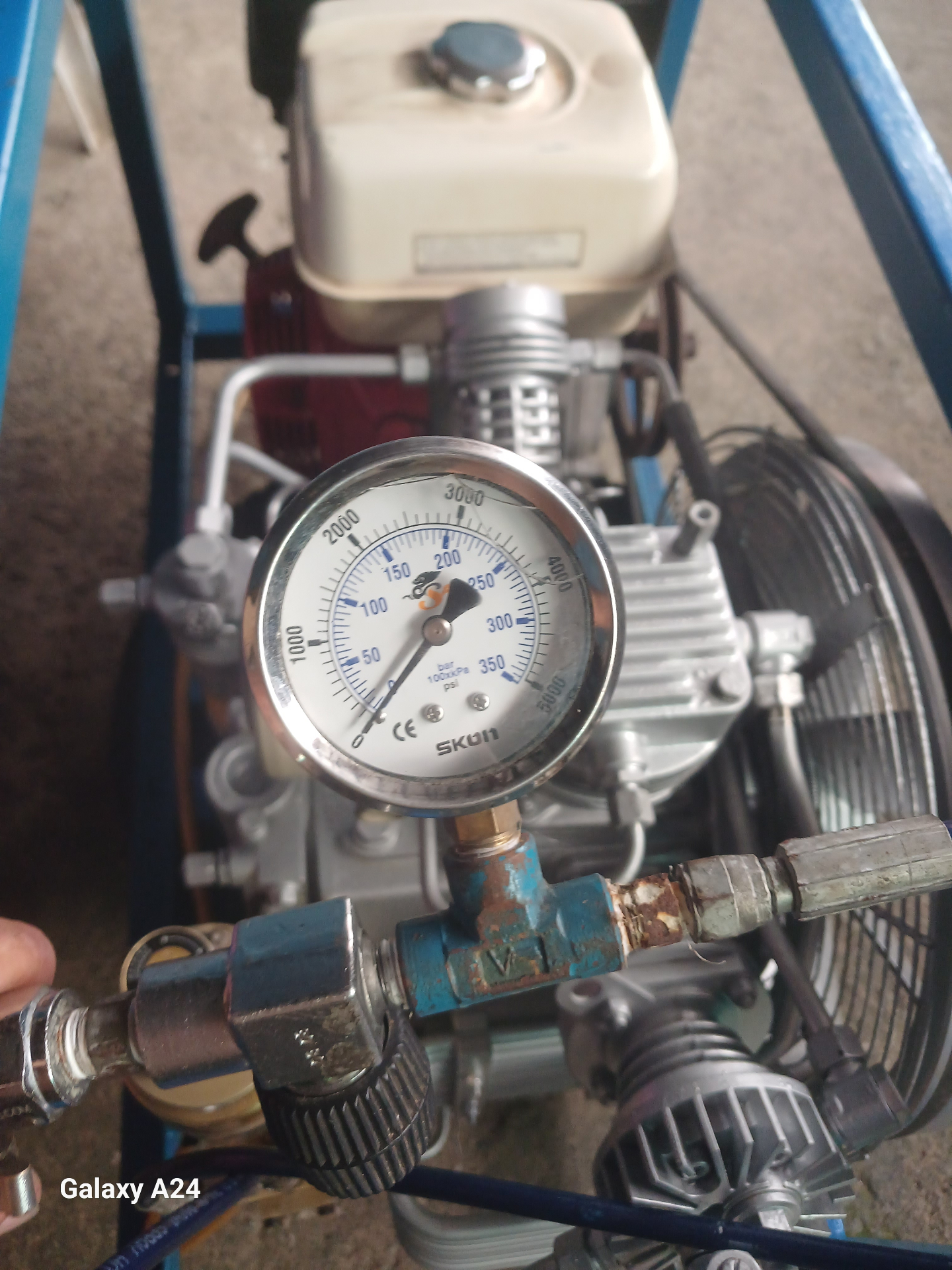 Pressure gauge close-up on portable compressor