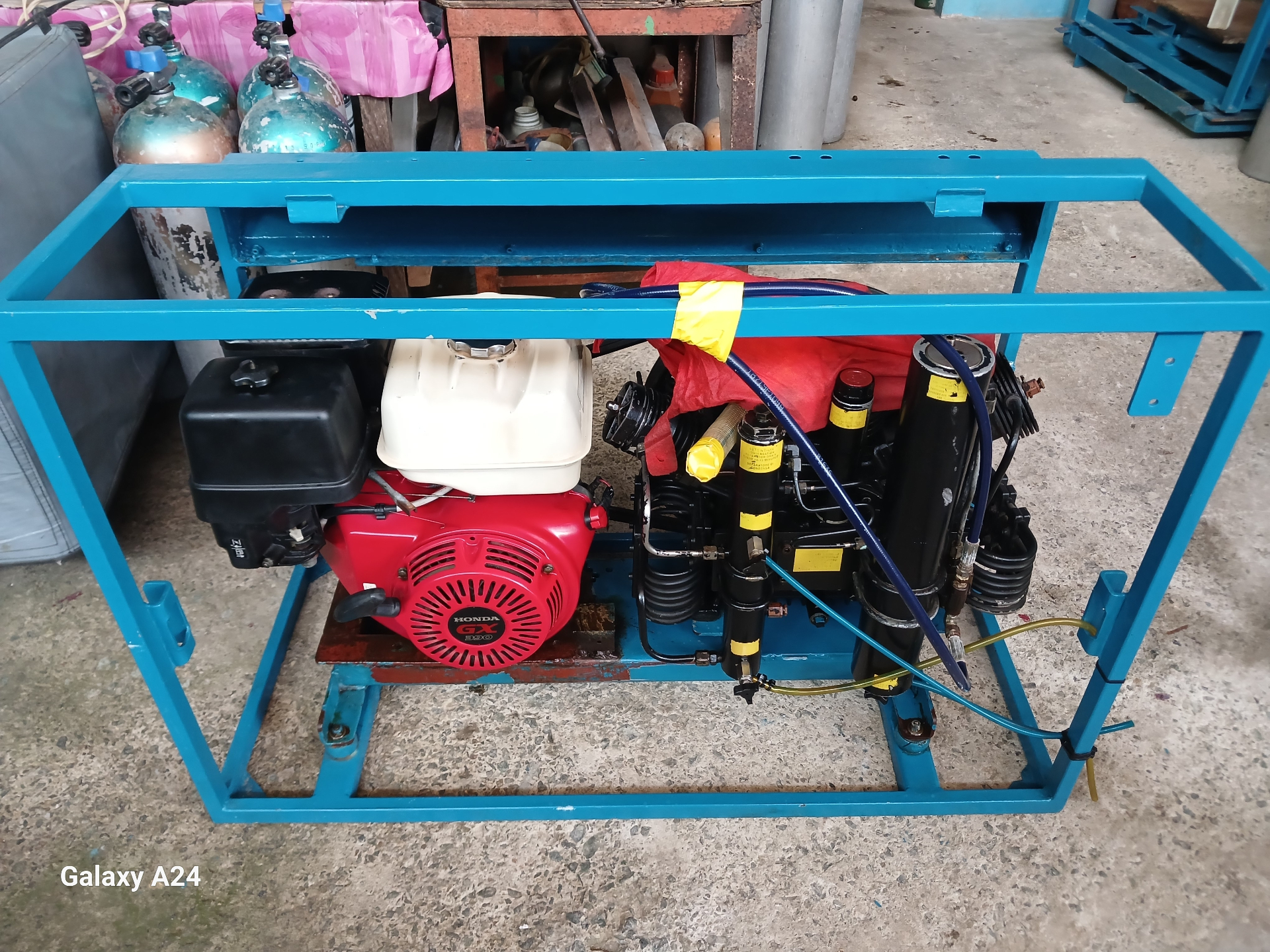 Honda-powered portable compressor in shop frame