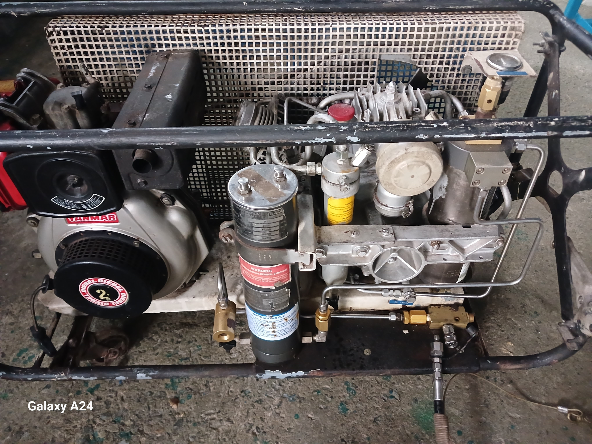 Yanmar-powered portable compressor in service cage