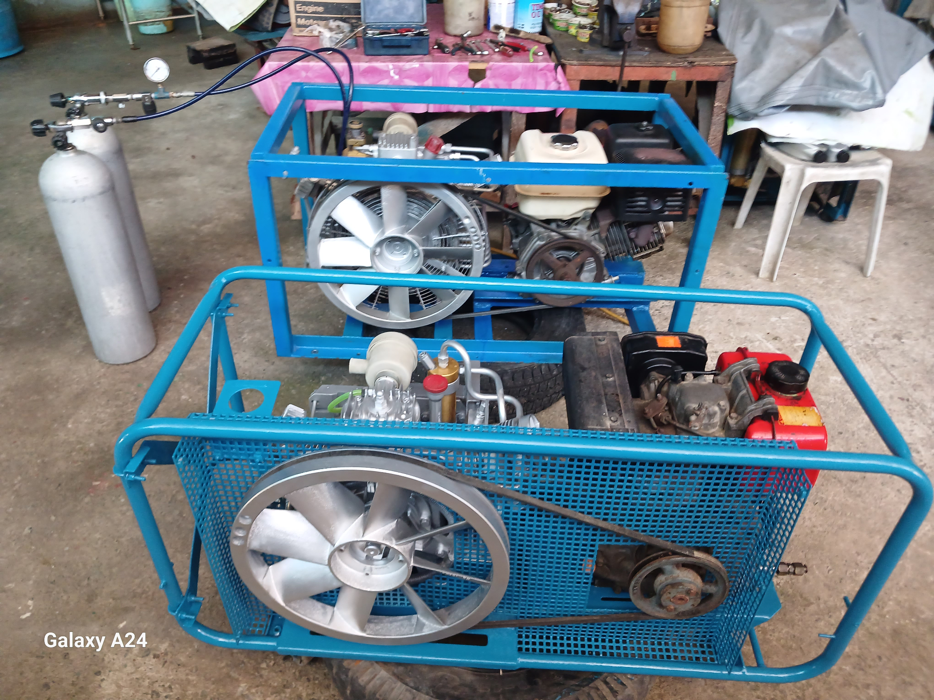 Two portable compressors under pressure-testing