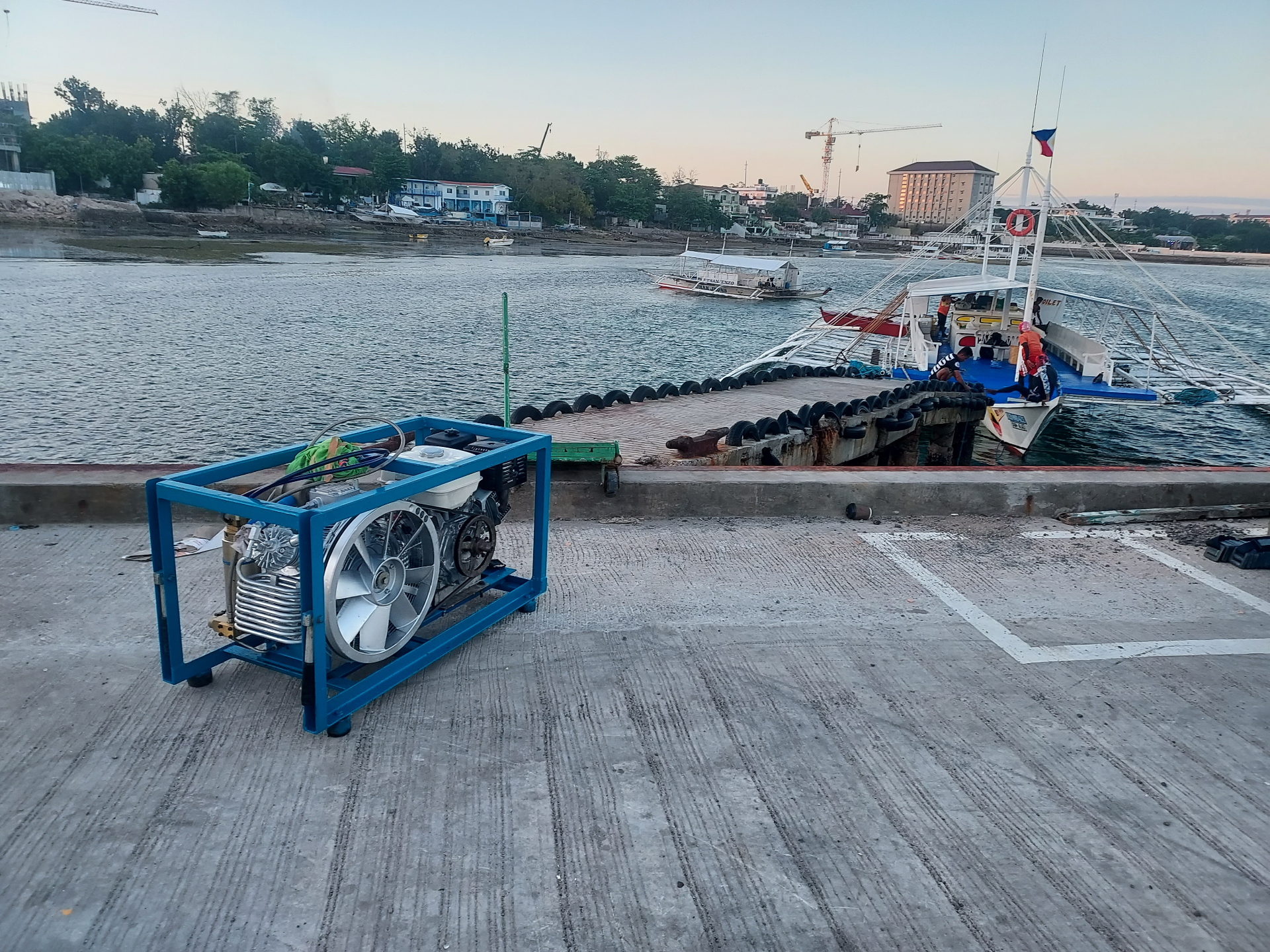 Portable compressor prepared at the pier