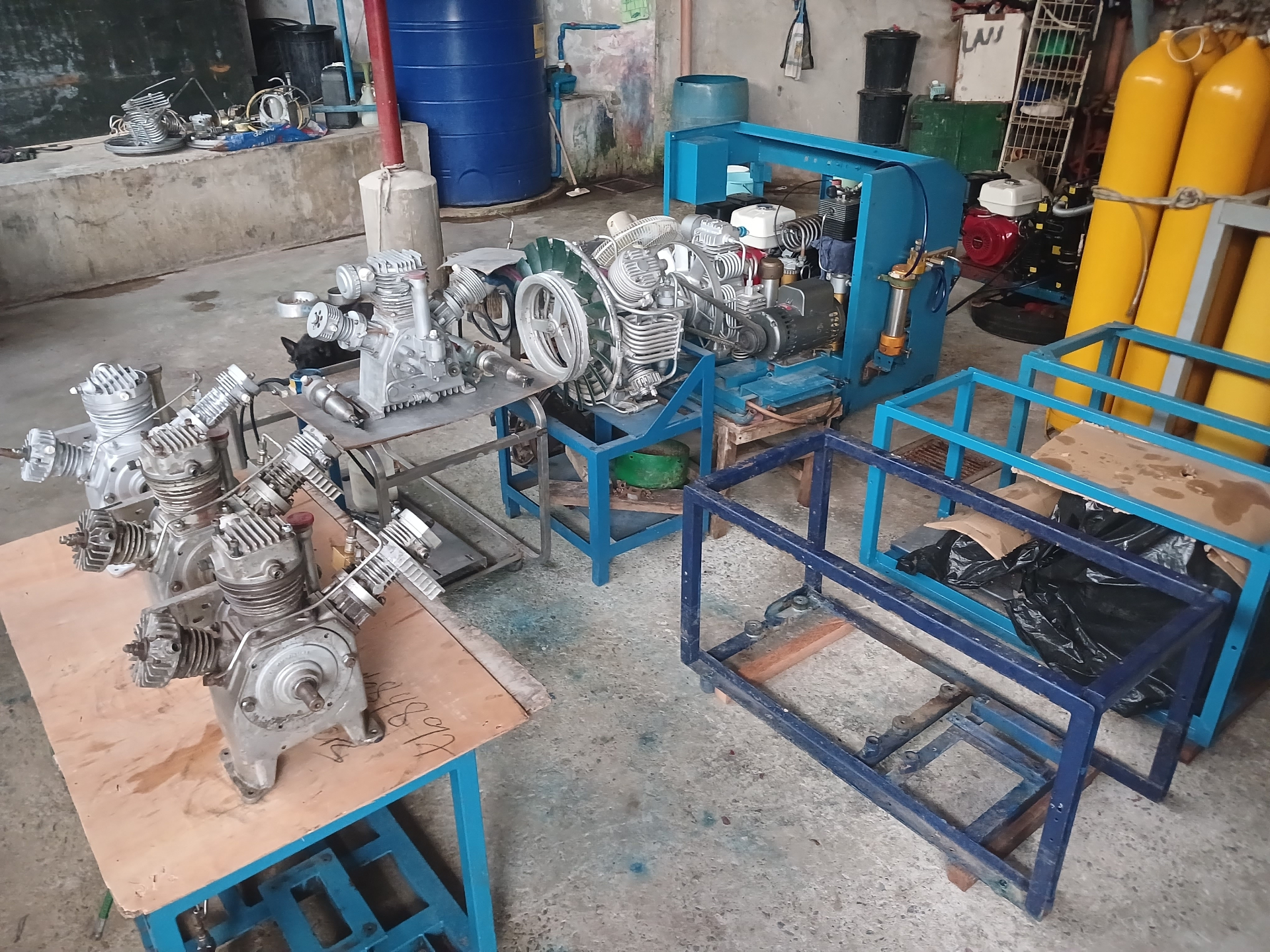 Shop floor lined with compressors mid-rebuild